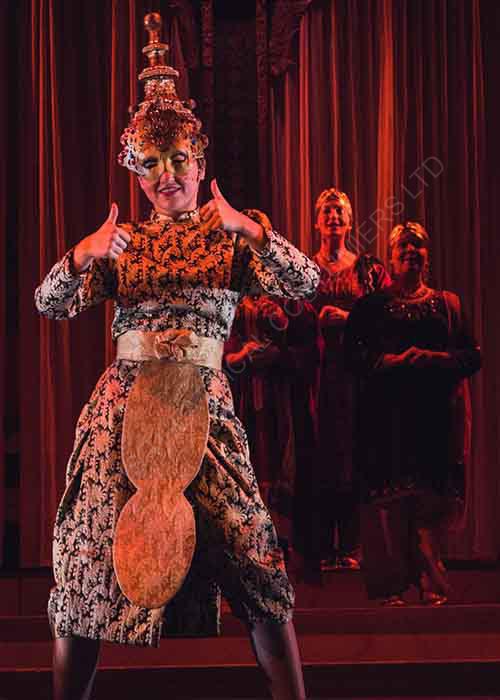 Eva In Gold Costume During Ballet Scene With Hair Piece